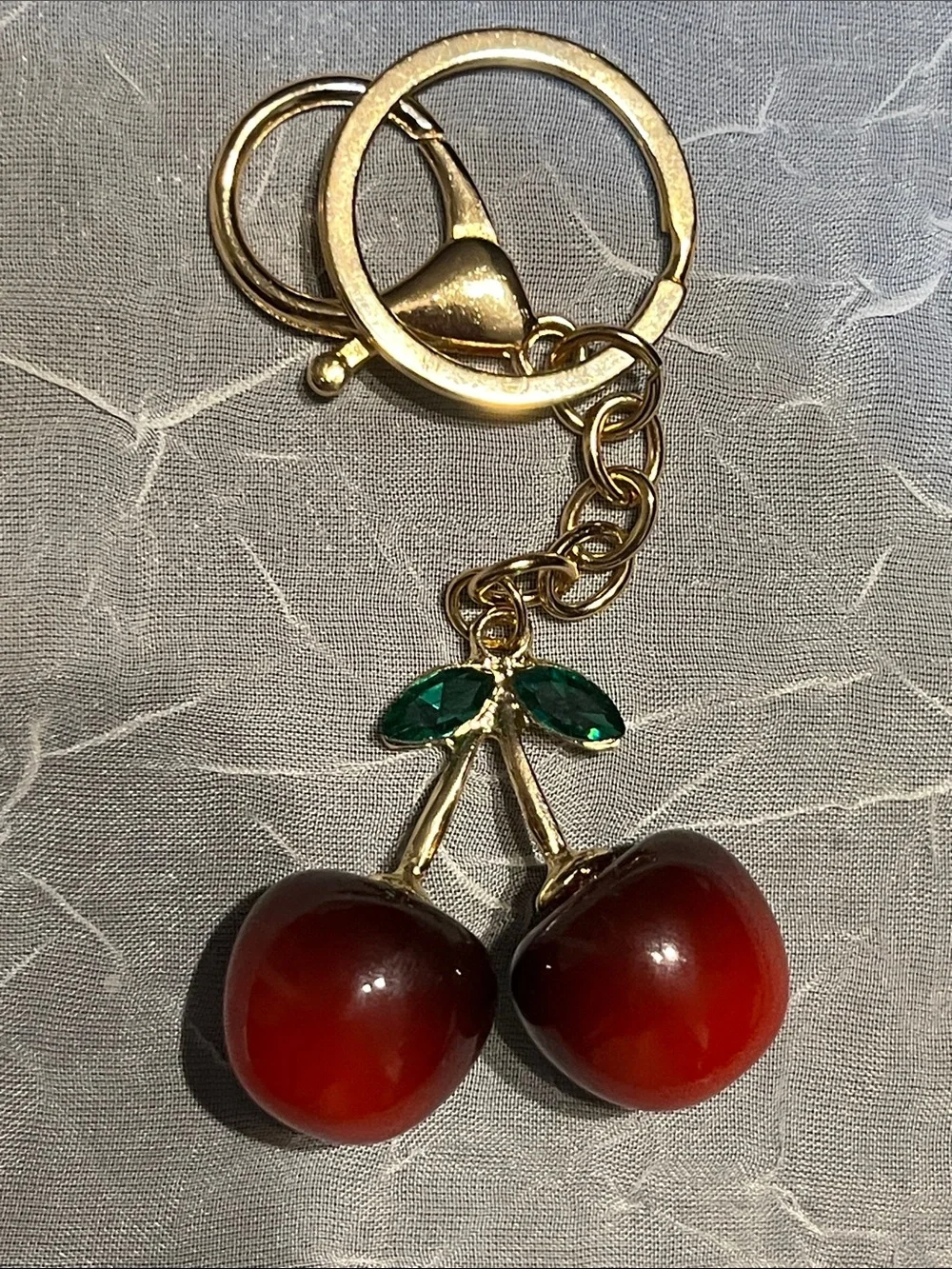 2 bag charms, Hello kitty and cherries big 4”